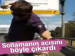 Rus sürücü kendisini sollayan araca saldırdı